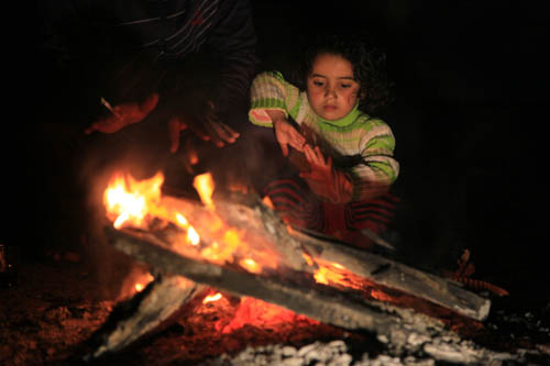 النار .. البديل الاوفر للتدفئة في فلسطين